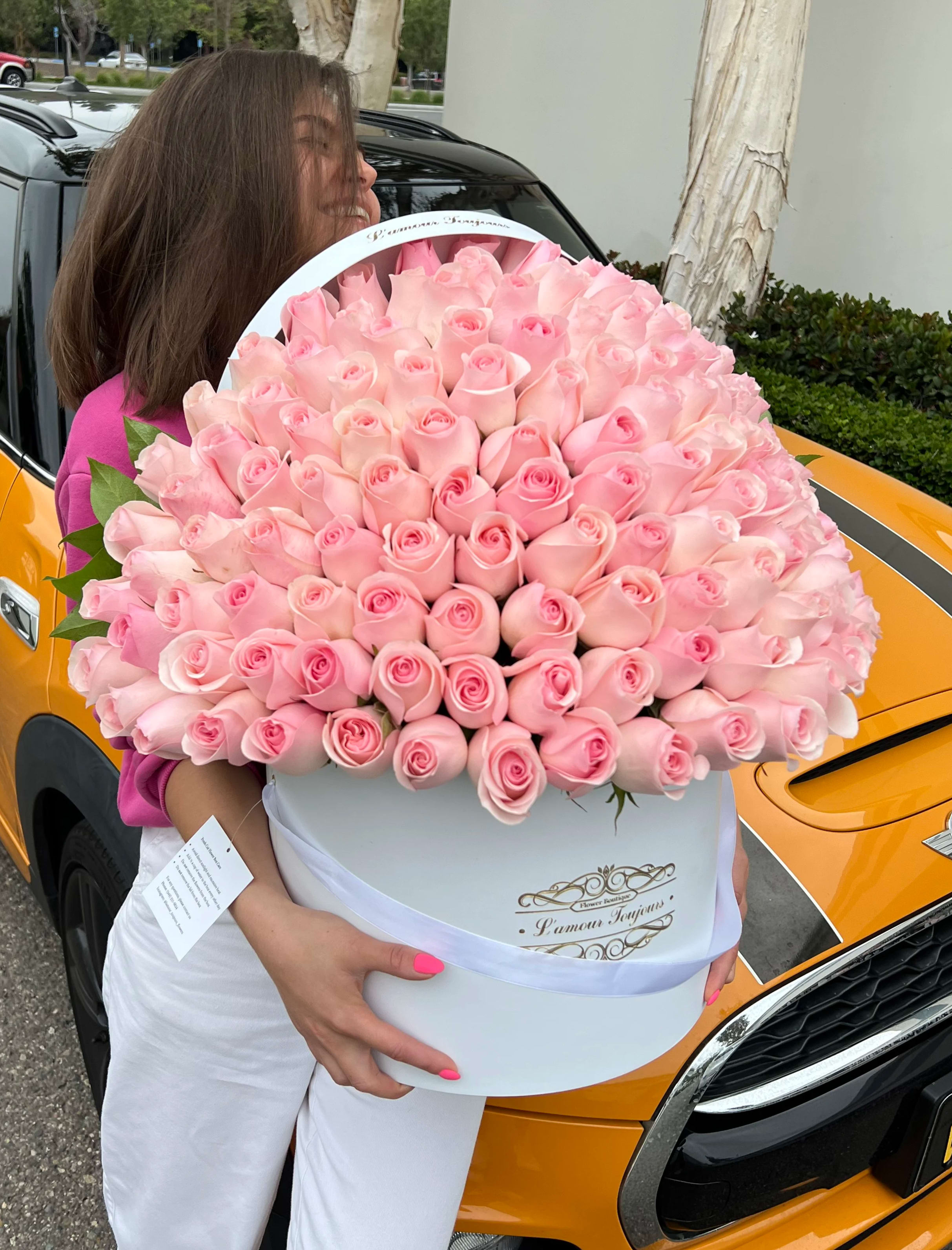 150 Pink Roses Signature Box - Discover premium flowers from L’amour Toujours Flower Boutique—luxury flowers designed to make every occasion unforgettable. Each arrangement features hand-selected  blooms, beautifully arranged in our signature hatbox with a refined gold-foil monogram.  Perfect for birthdays, anniversaries, corporate gifting, or simply expressing love, our premium flower arrangements combine timeless elegance with modern sophistication.   As the ultimate luxury floral gift box, every detail is crafted to impress and delight. Elevate your gifting with fresh, hand-crafted flowers delivered in signature style—because every moment deserves to be remembered.