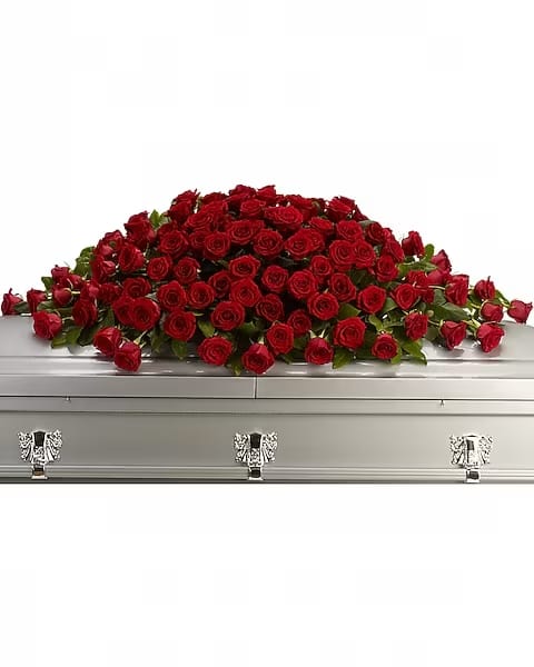 Greatest Love Casket Spray - "A loving embrace of rich, regal roses in an all-red spray to adorn the casket. 