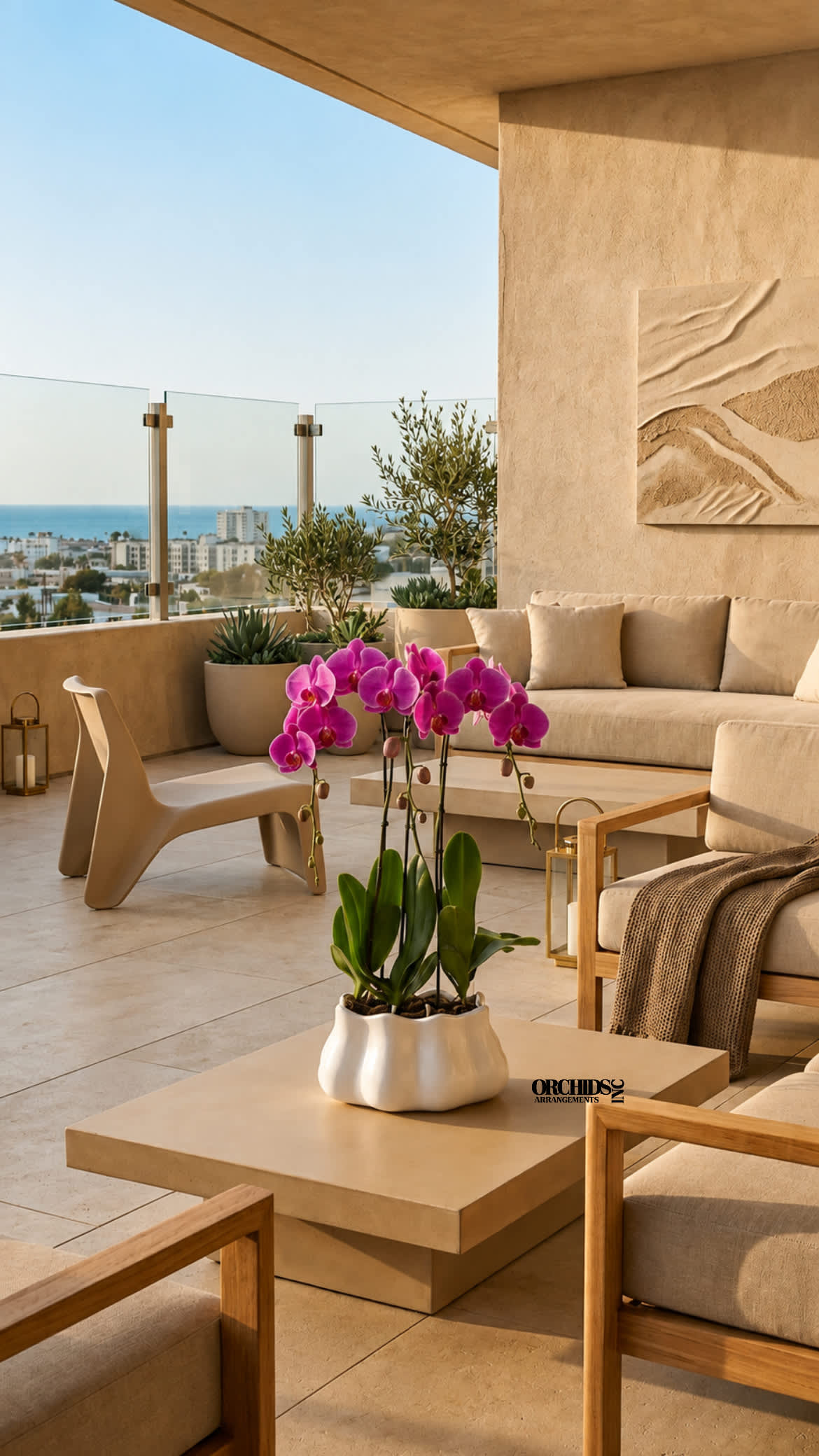 Potted pink orchid arrangement on a beige table in a modern patio seating area