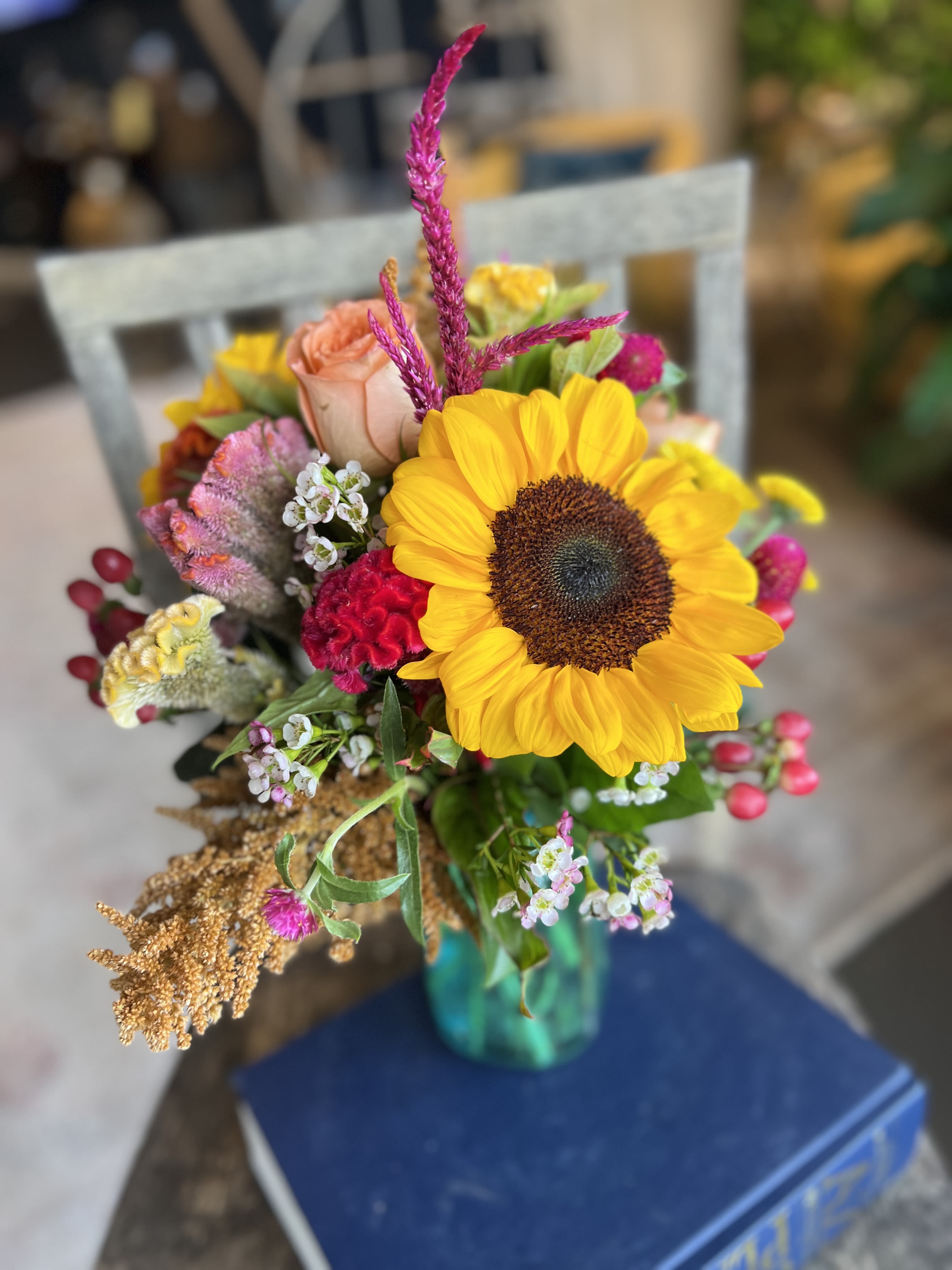 Autumnal Designer's Choice - Send a truly memorable gift and allow our talented designers to create a beautiful arrangement with the freshest blooms of the fall season!  Each piece will be an artistic expression rooted in our signature design aesthetic, ensuring your handcrafted arrangement is beautiful, fresh and one of a kind!