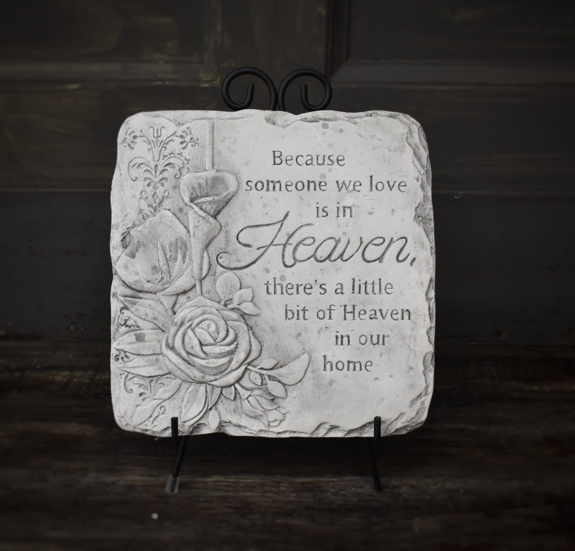 Decorative memorial plaque with roses and a sympathy quote