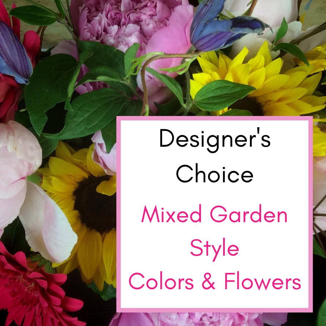 Mixed bouquet of colorful flowers with a designer's choice sign