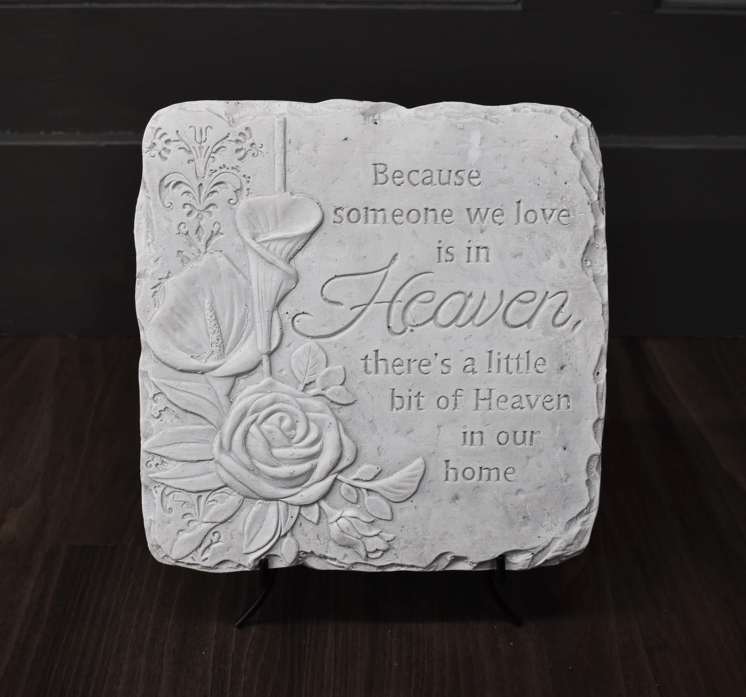 Decorative memorial plaque with roses and a sympathy quote