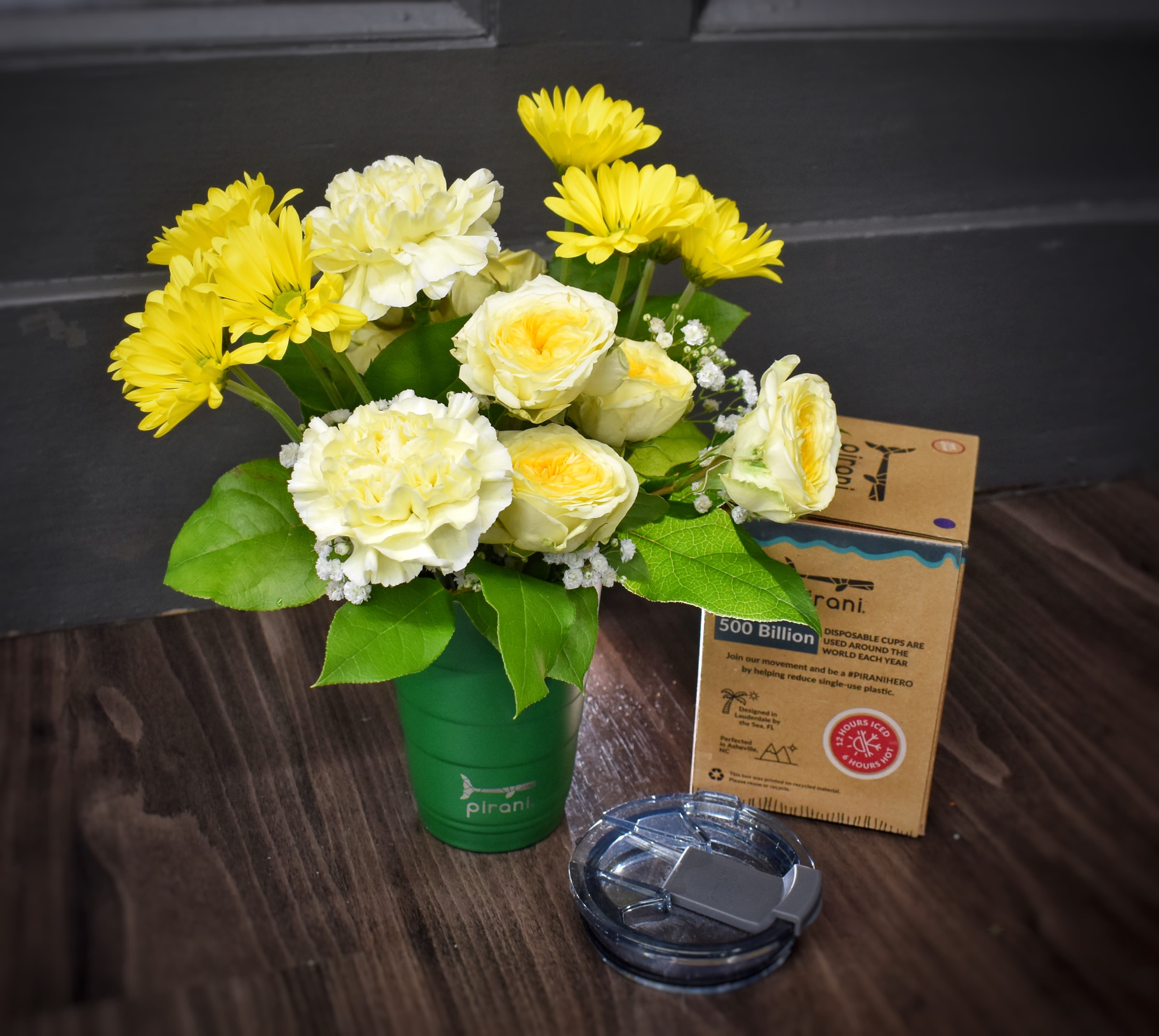 Sippy Stems Sunshine Yellow - Our dark green insulated Pirani tumbler is filled with shades of yellow flowers. The 16oz number keeps beverages hot or cold for up to 12 hours