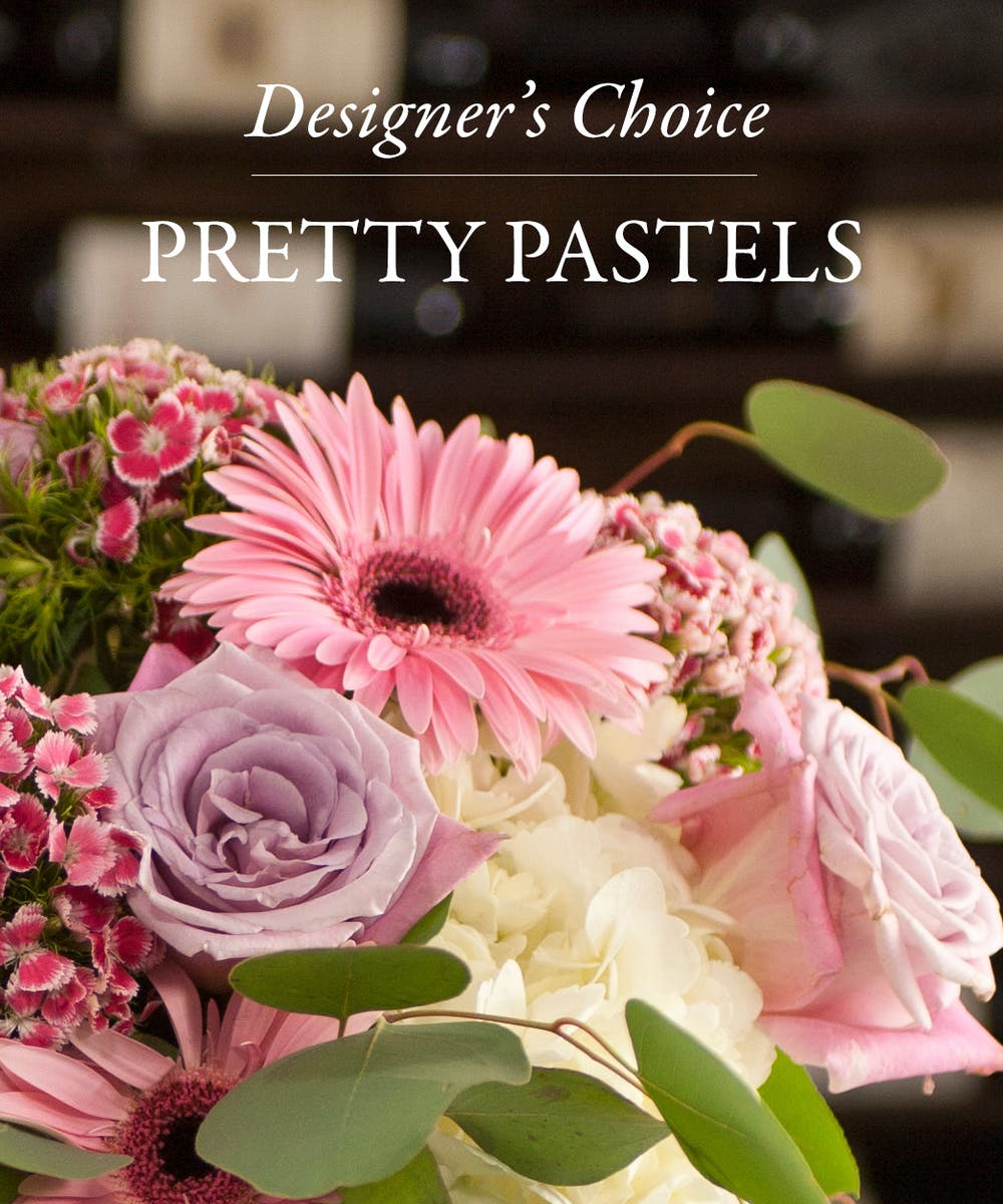 Pastel bouquet with pink gerbera daisies, lavender roses, and white hydrangea