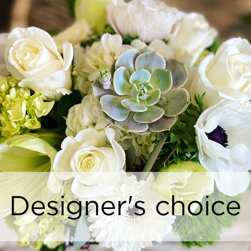 White roses and white anemones with a succulent centerpiece