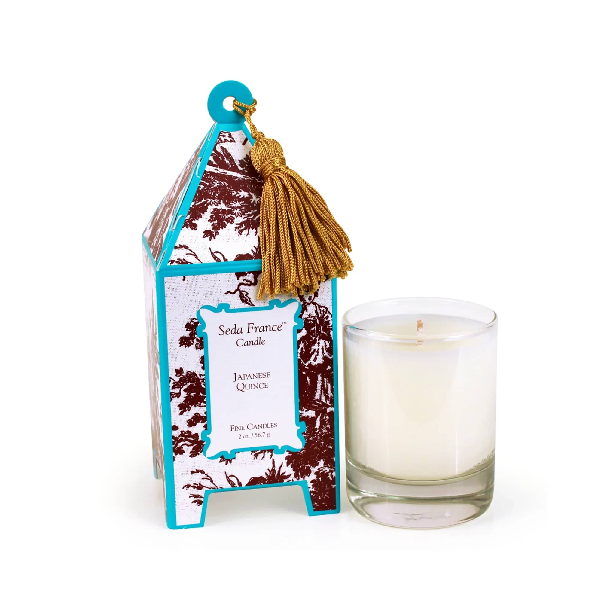 Japanese Quince Classic Toile Mini Pagoda Box Candle by Seda France - Appealingly provocative, Japanese Quince, is a piquant fragrance with aspects of rhubarb, passion fruit and white fleshed peach over a heart of white jasmine petals. This powerful and diffusive fragrance is one of our best sellers. Available in this Mini Pagoda version of our signature "no wrapping paper needed" packaging, with a glass votive inside. Hand-poured candles, 2 ounces, burn time of 15-20 hours, and always the perfect gift. - Approximate burn time: 15-20 Hours - Rhubarb, passion fruit, white fleshed peach and white jasmine petals - Signature packaging, needs no gift wrapping