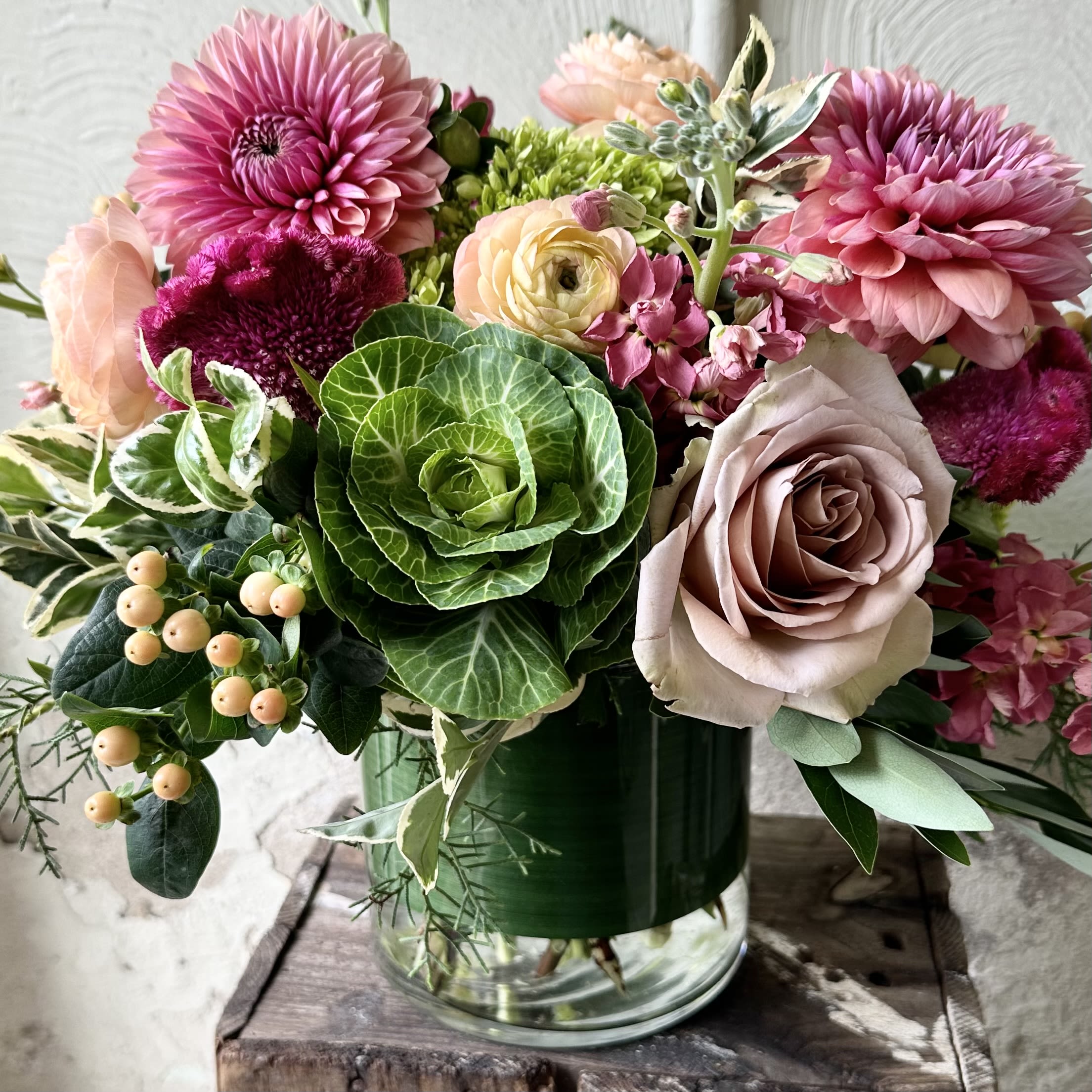 Autumn Chic - Chic feminine Fall tones of seasonal florals that showcase dahlias, ranunculus, celosia, hypericum and ornamental kale.