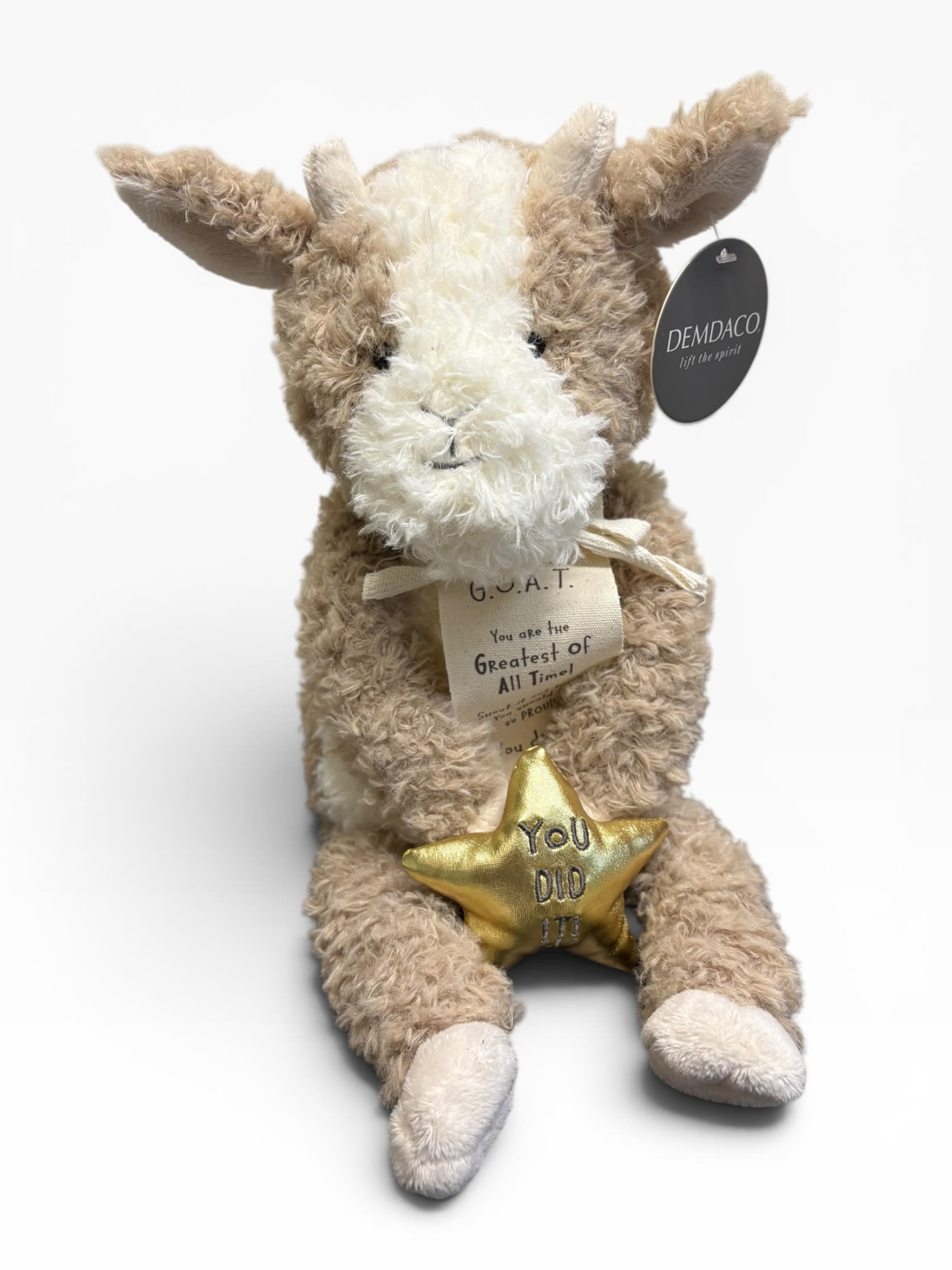 G.O.A.T Goat Plush - Super soft goat plush that is holding a message that says "You are the G.O.A.T. You are the Greatest of All Time! Shout it out loud...You should be PROUD! You did it!" &amp;  also holding a star that says "You Did It".  Sits 9in tall. 