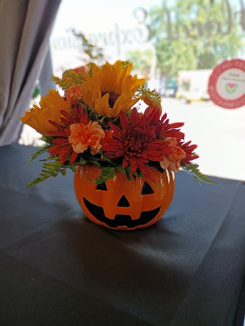 Jack O' Blooms - This spooktacular bouquet is perfect for all of your fall and holiday celebrations.