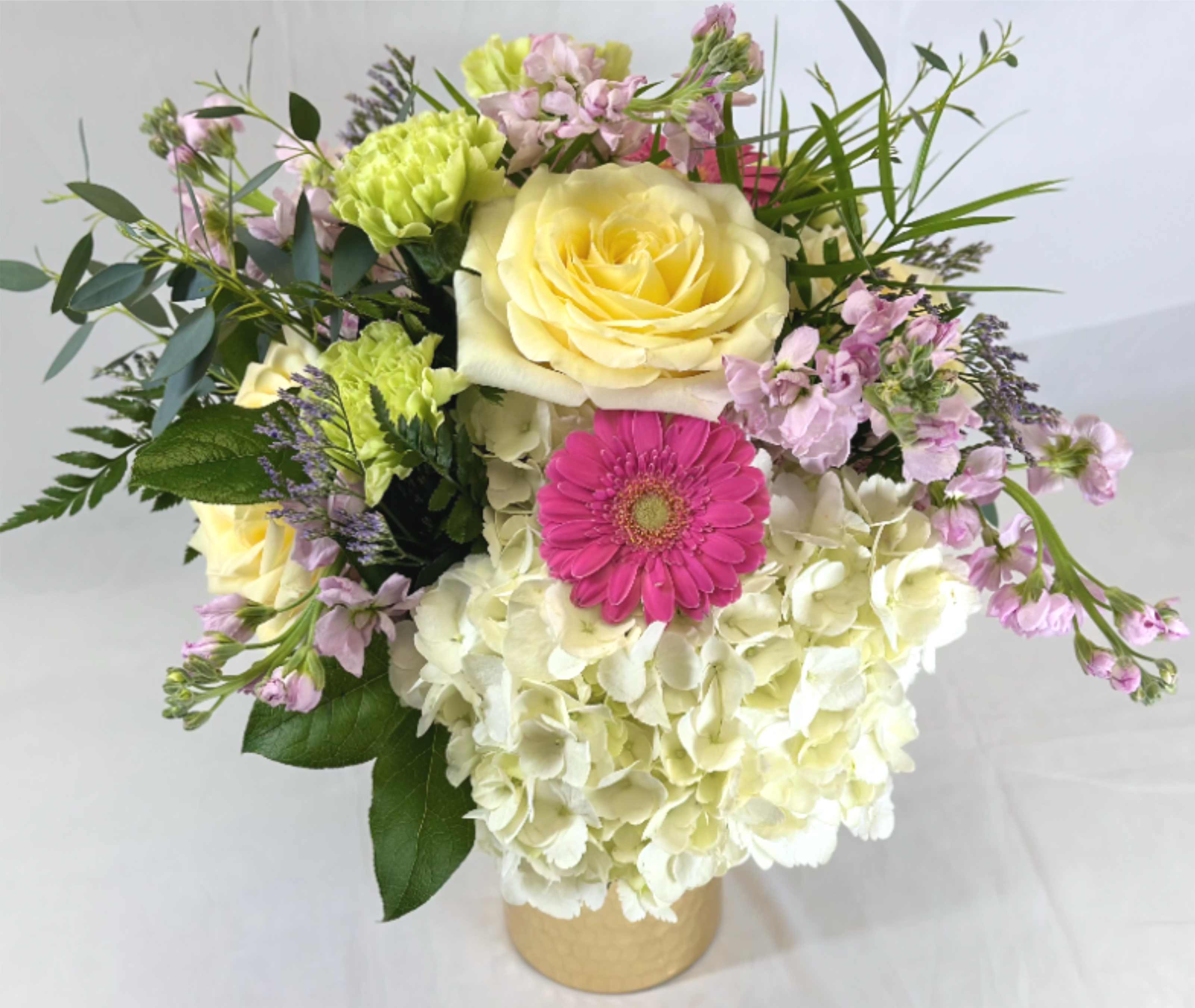 Wonderful You - Fun and carefree, this Leary's Flowers exclusive arrangement highlights a bit of whimsy with beautiful flowers and a fun design. Hydrangeas, roses, stock, and other flowers will surely brighten someone's day.  If the featured flowers are unavailable we will design your piece using the freshest blooms of equal or greater value