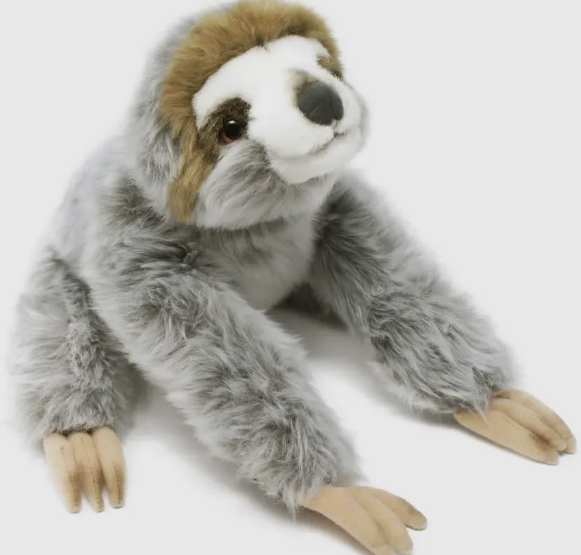 Plush sloth toy with gray fur and tan claws on a white background