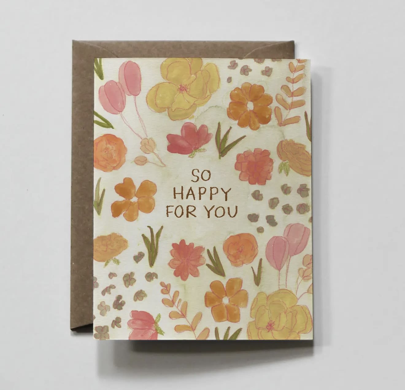 Floral greeting card with "So Happy For You" text on a brown envelope