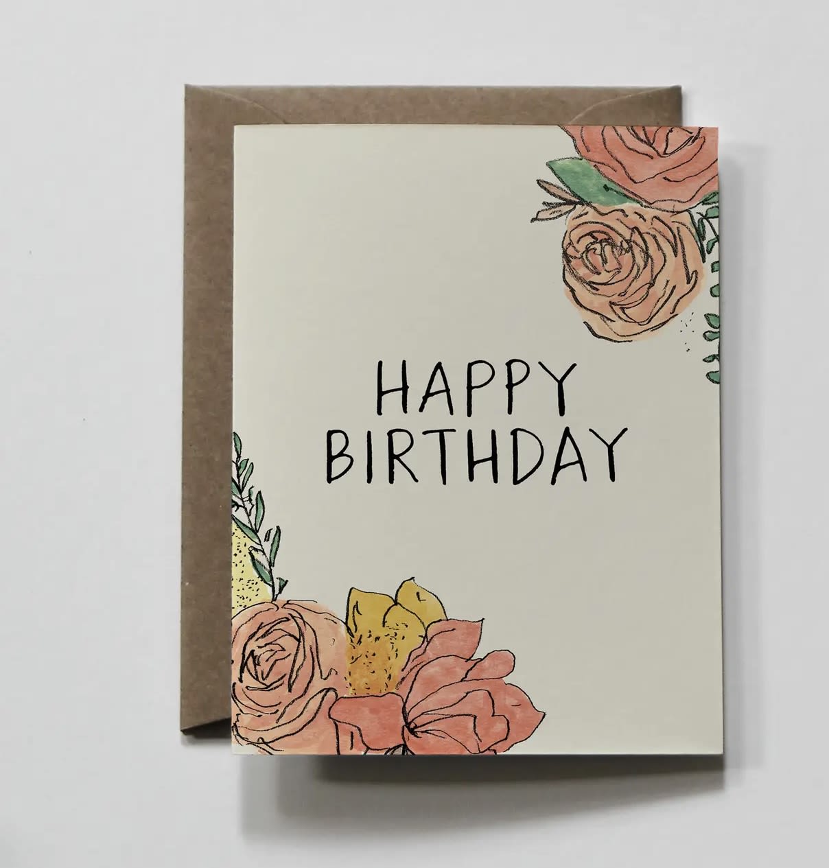 Birthday card with floral illustrations and a kraft envelope