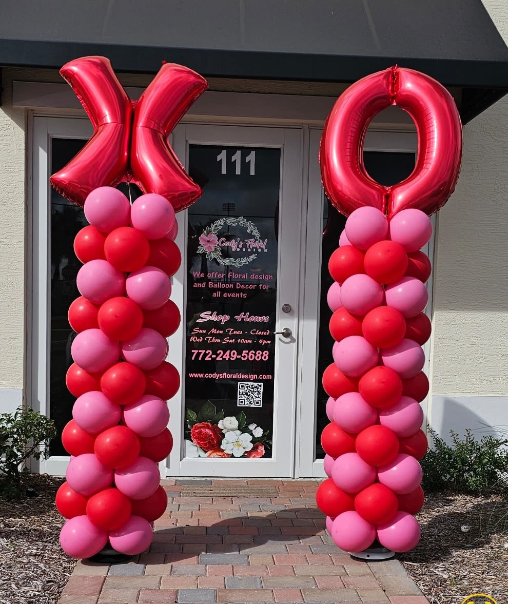 Balloon Column - Make your holiday celebration unforgettable. Premium Christmas Balloon Columns crafted with high-quality balloons and designer color palettes.” 