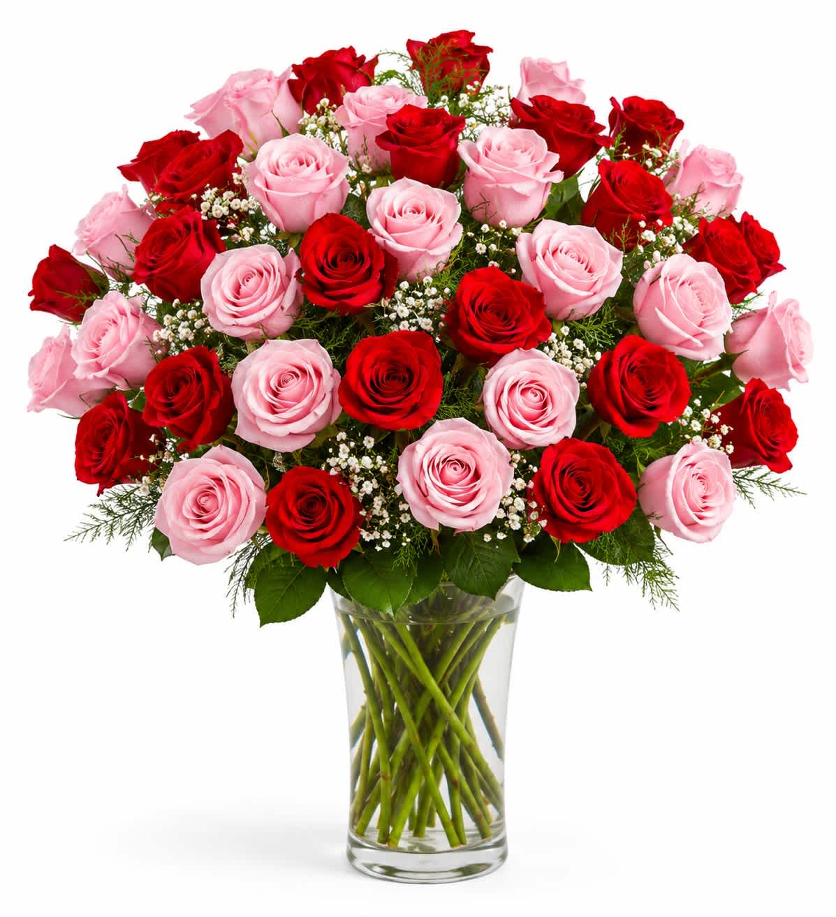 Bouquet of red and pink roses in a clear glass vase