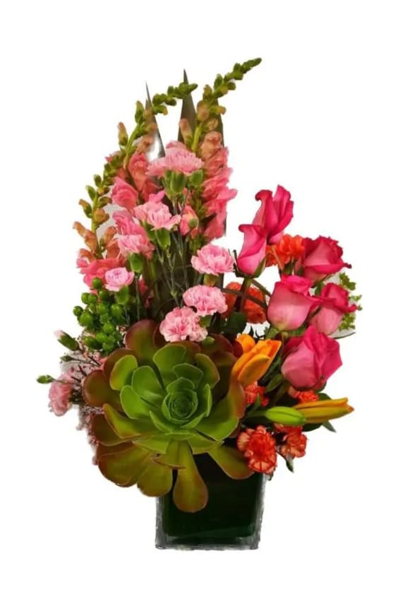 Mixed bouquet with pink roses, carnations, and succulents in a glass vase