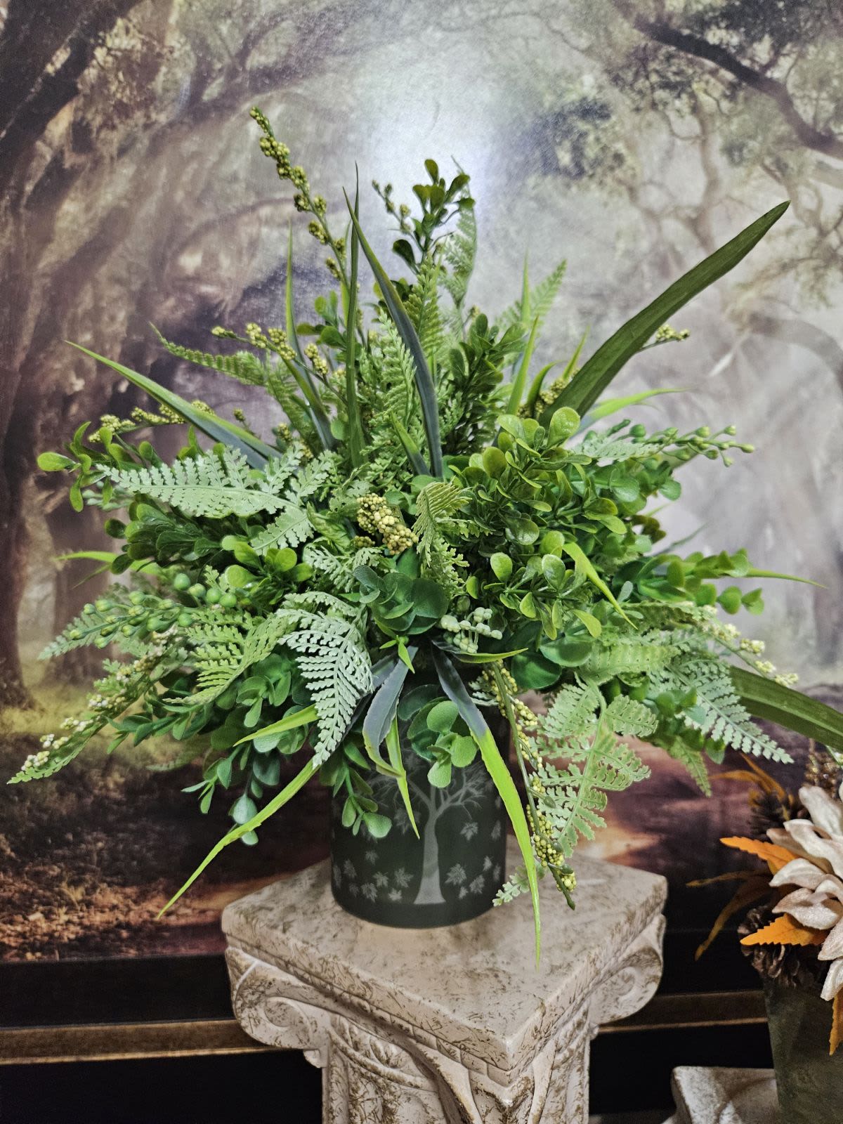 Farmhouse Greens Silk - A very trendy silk full of mixed silk greens in a green vase decorated with sketches of trees 