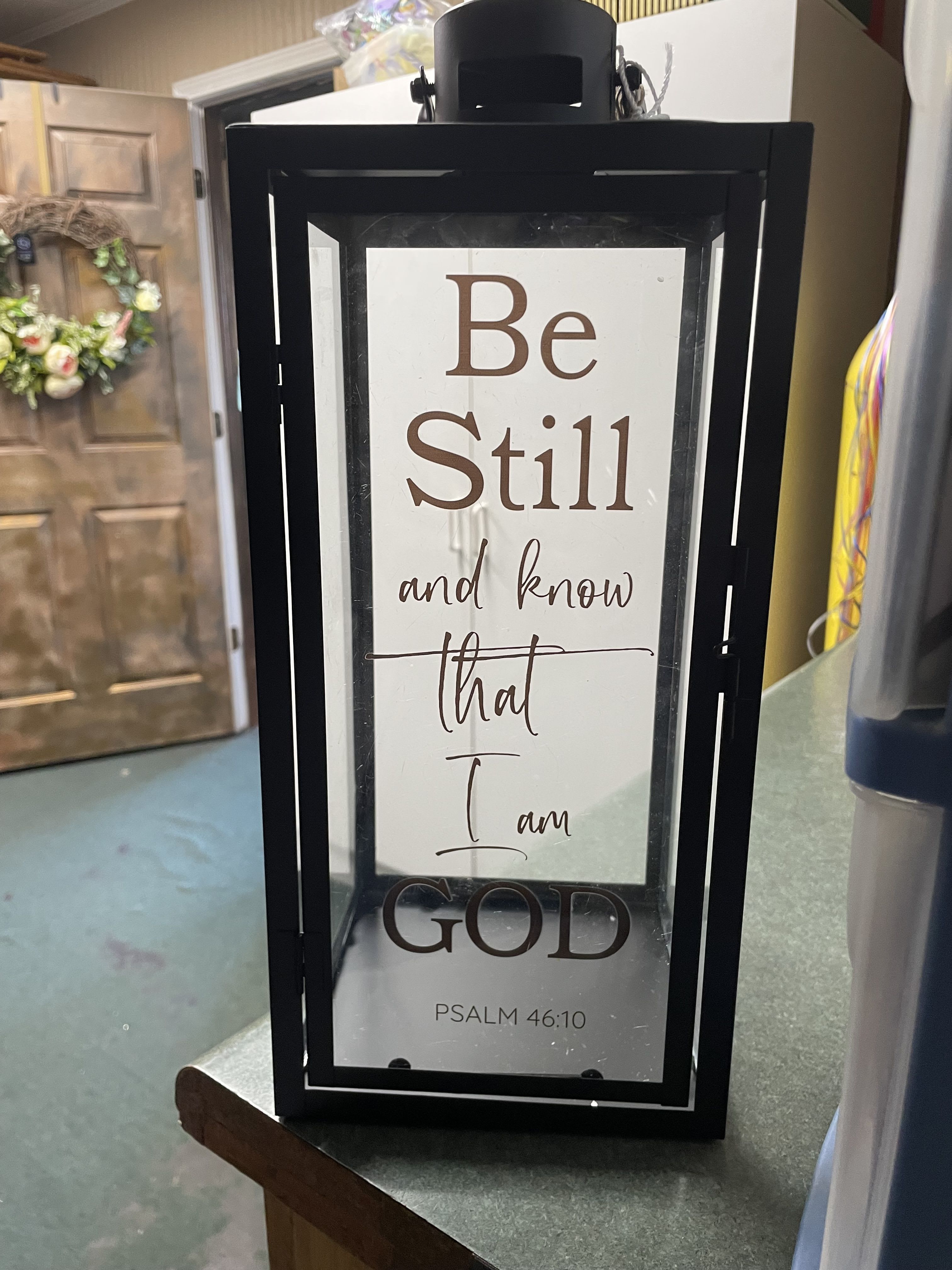 Framed sign with the words "Be Still and know that I am God"
