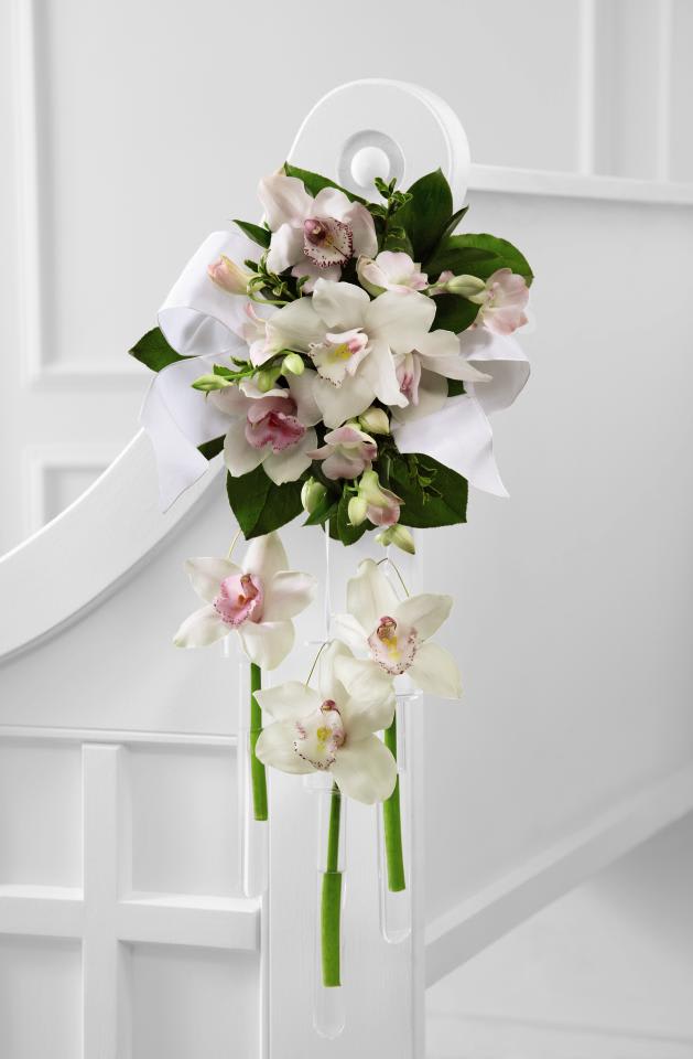 FTD Perfect Entrance Pew Arrangement - The FTDÂ® Perfect Entranceâ¢ Pew Arrangement creates the ideal ambiance  for your trip down the aisle. White and pink Cymbidium Orchids are  brought together with Dendrobium Orchids and lush greens, gorgeously  accented with white taffeta and satin ribbons, to create an exceptional  display of bridal elegance. Approx. 28âH x 13âW.