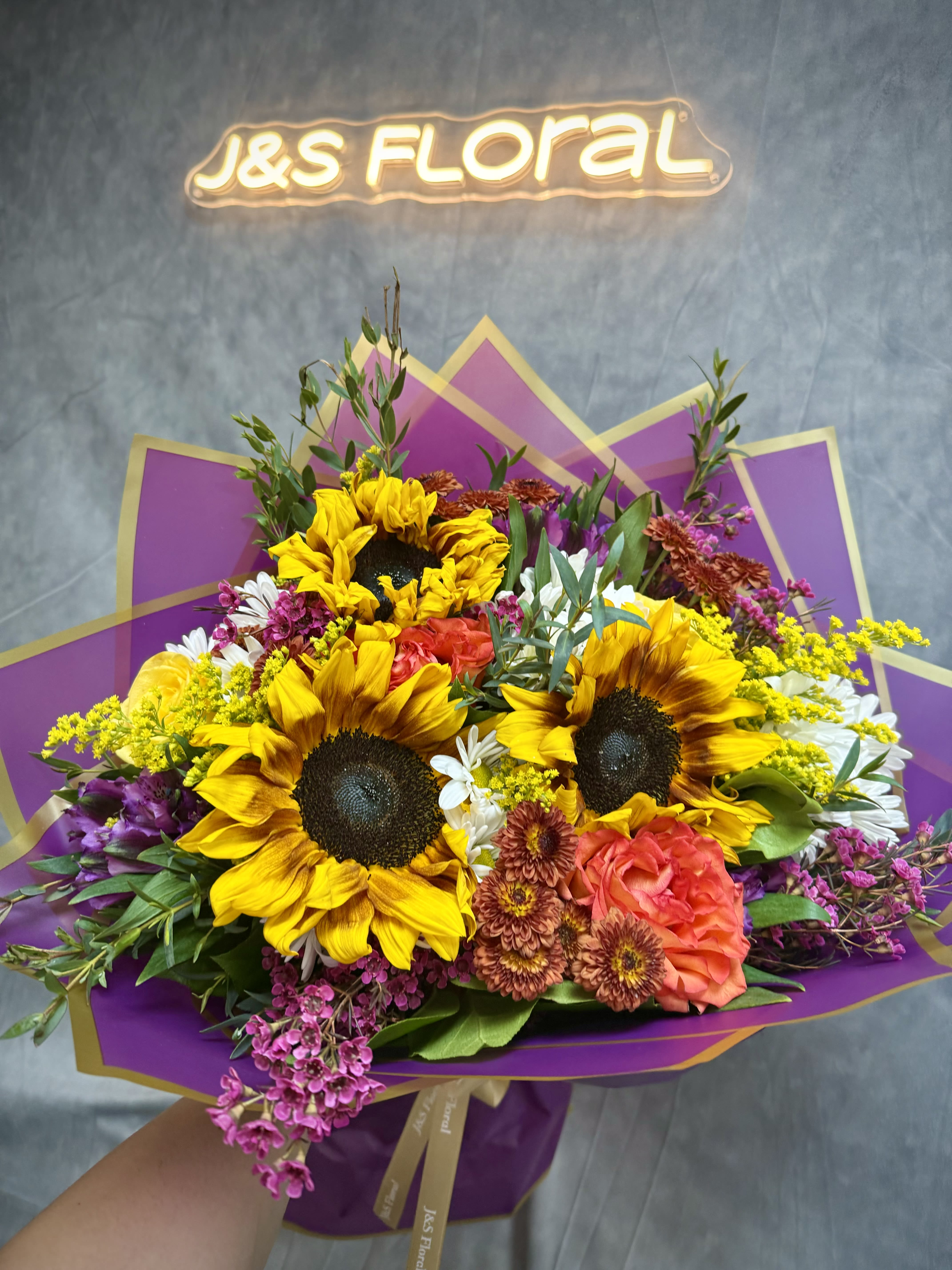 Celebrate Me - Introducing our design Celebrate Me! Beautifully arranged with Gerbera, Roses, Buttons, Alstroemerias, mini carnations, fillers and greenery in a stunning wrapping papers. The perfect gift for any occasion!