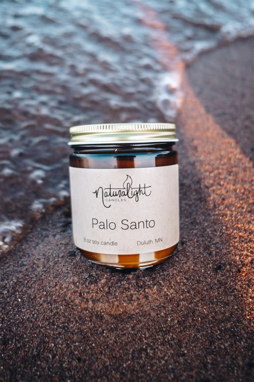 Natural Lights Palo Santo Candle - Locally made in Duluth and available in a 14oz jar.