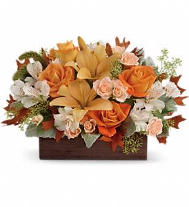 Fall Chic Bouquet - This impressive arrangement features light orange and peach roses, peach asiatic lilies and white alstroemeria, and finished with dusty miller, seeded eucalyptus and millet. Delivered in a Dark Bamboo Rectangle. Approximately 18 W x 11 3/4 H 