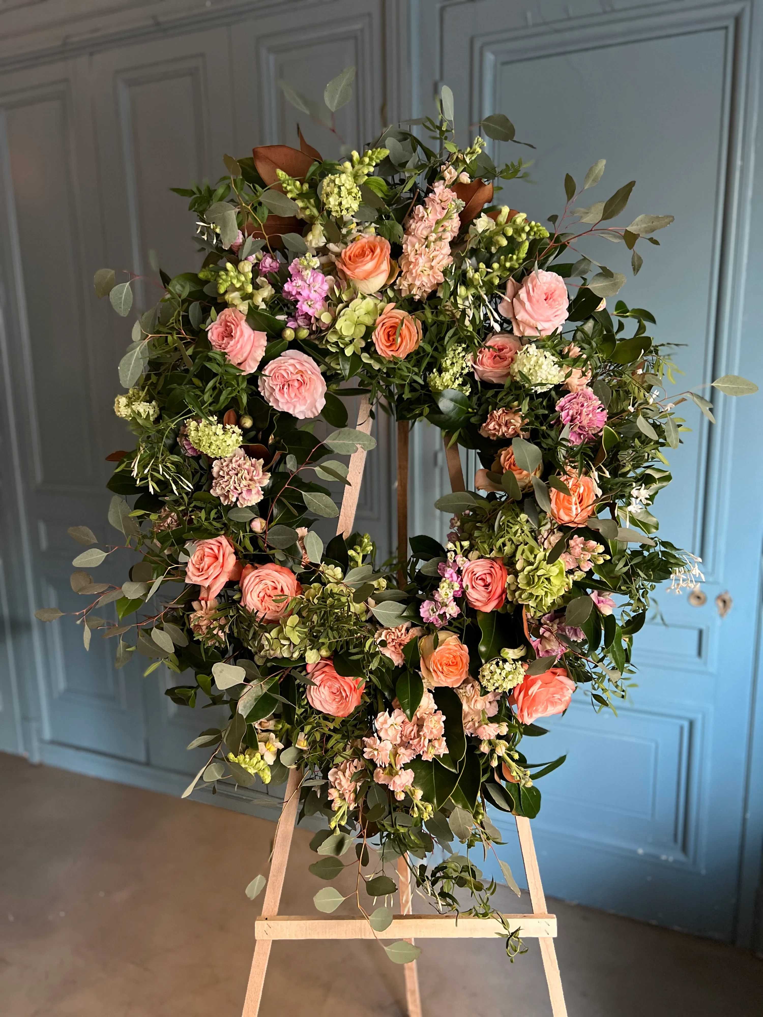 British style pastel colors. - Funeral wreath in pastel colors.