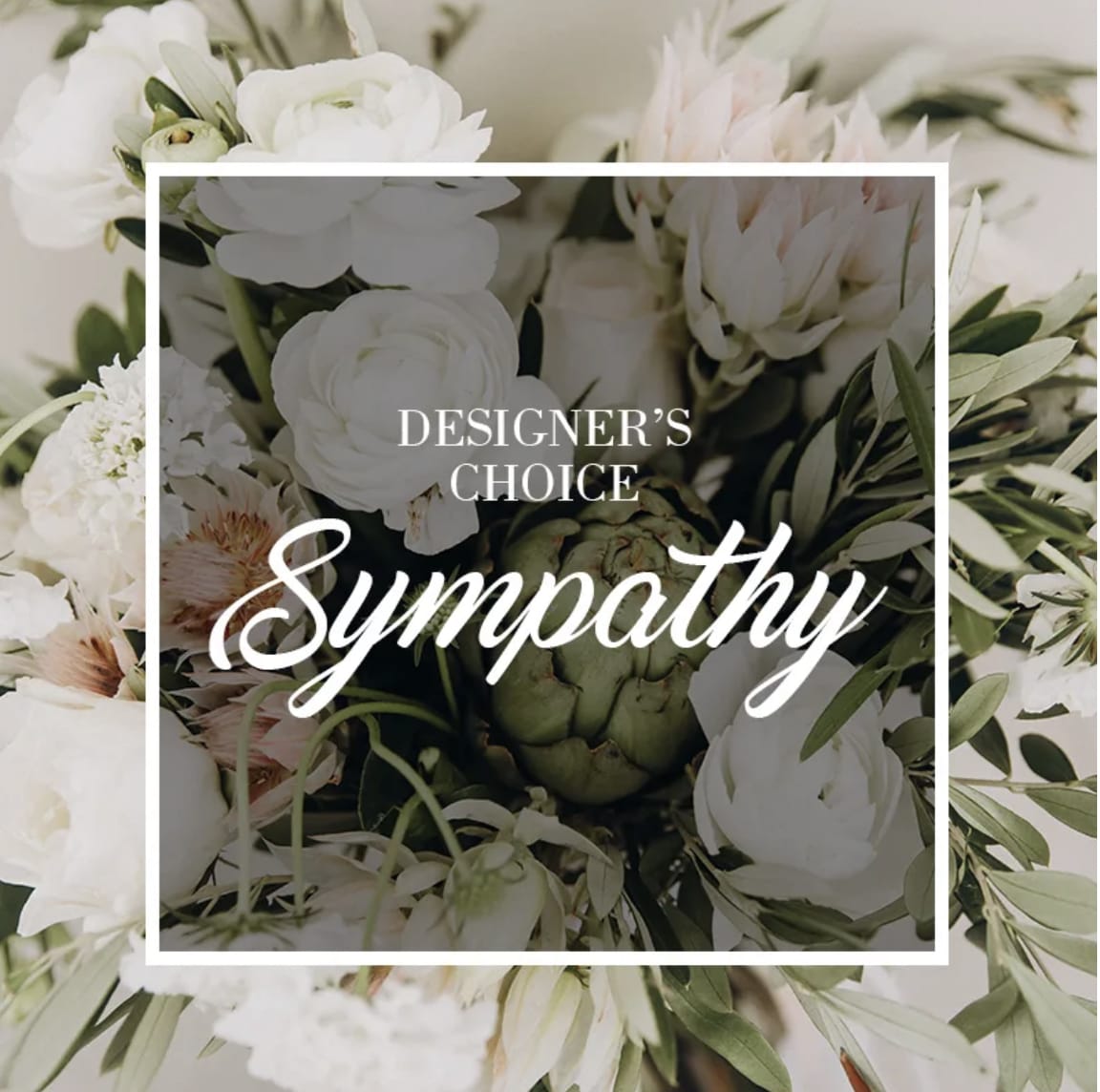 White sympathy bouquet with pale pink flowers and greenery