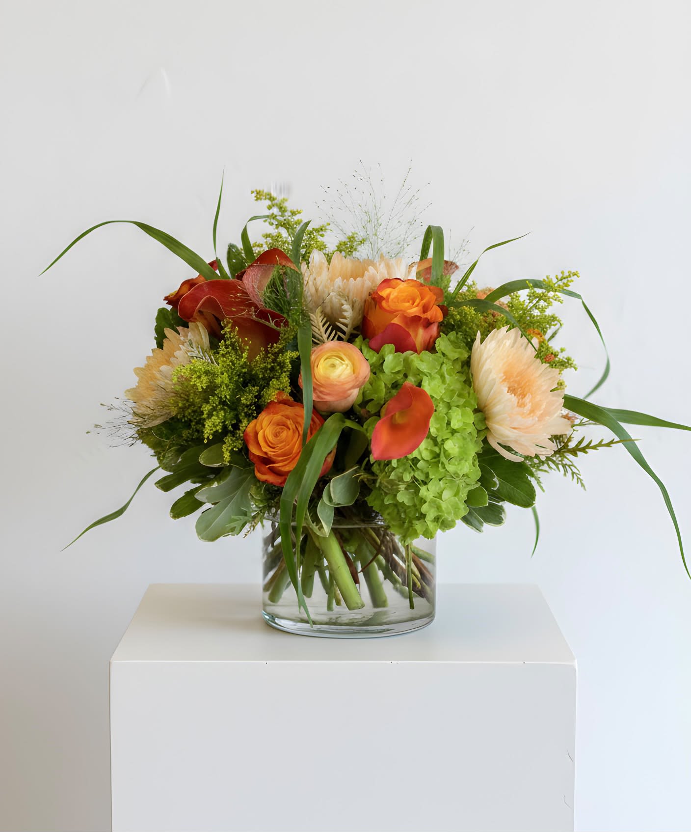 Orange You Glad To See Me - This vibrantly colored yellow and orange arrangement is sure to delight any recipient.  