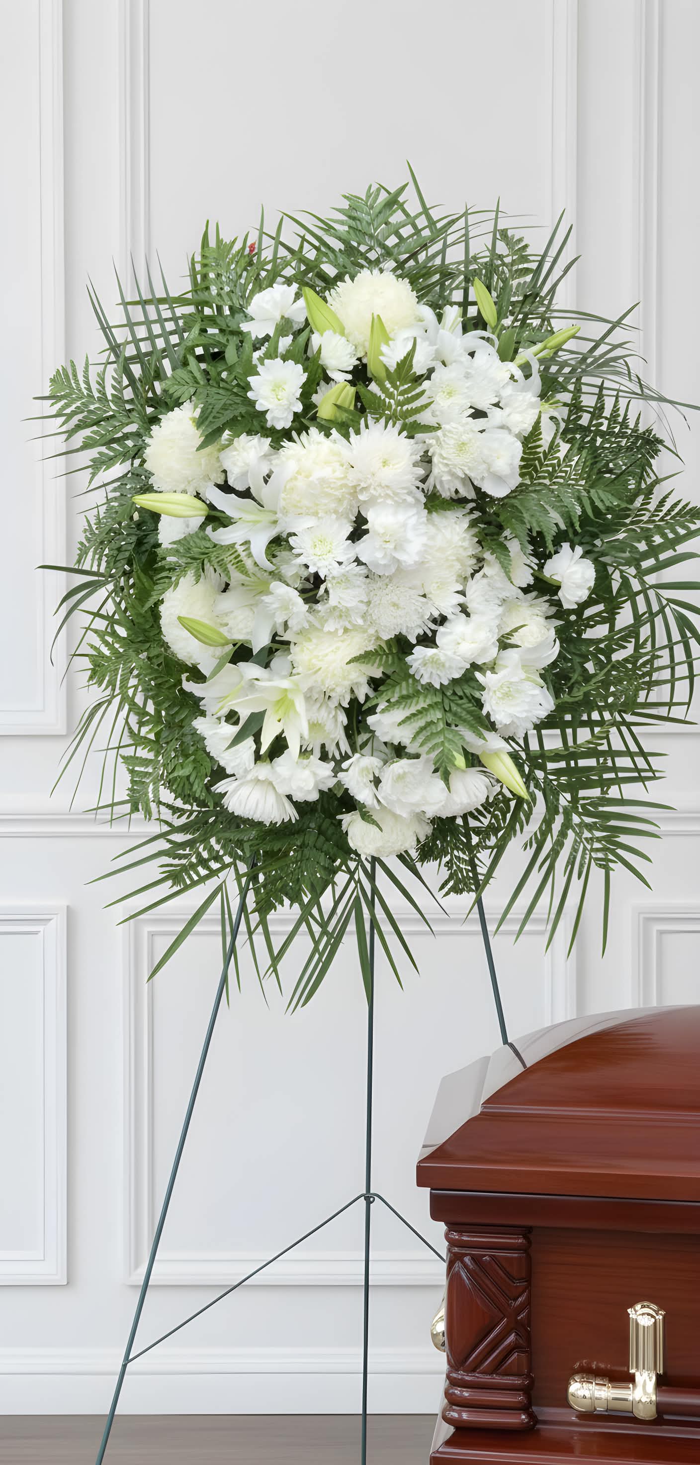White Funeral Spray - An elegant floor spray composed of whites and greens.