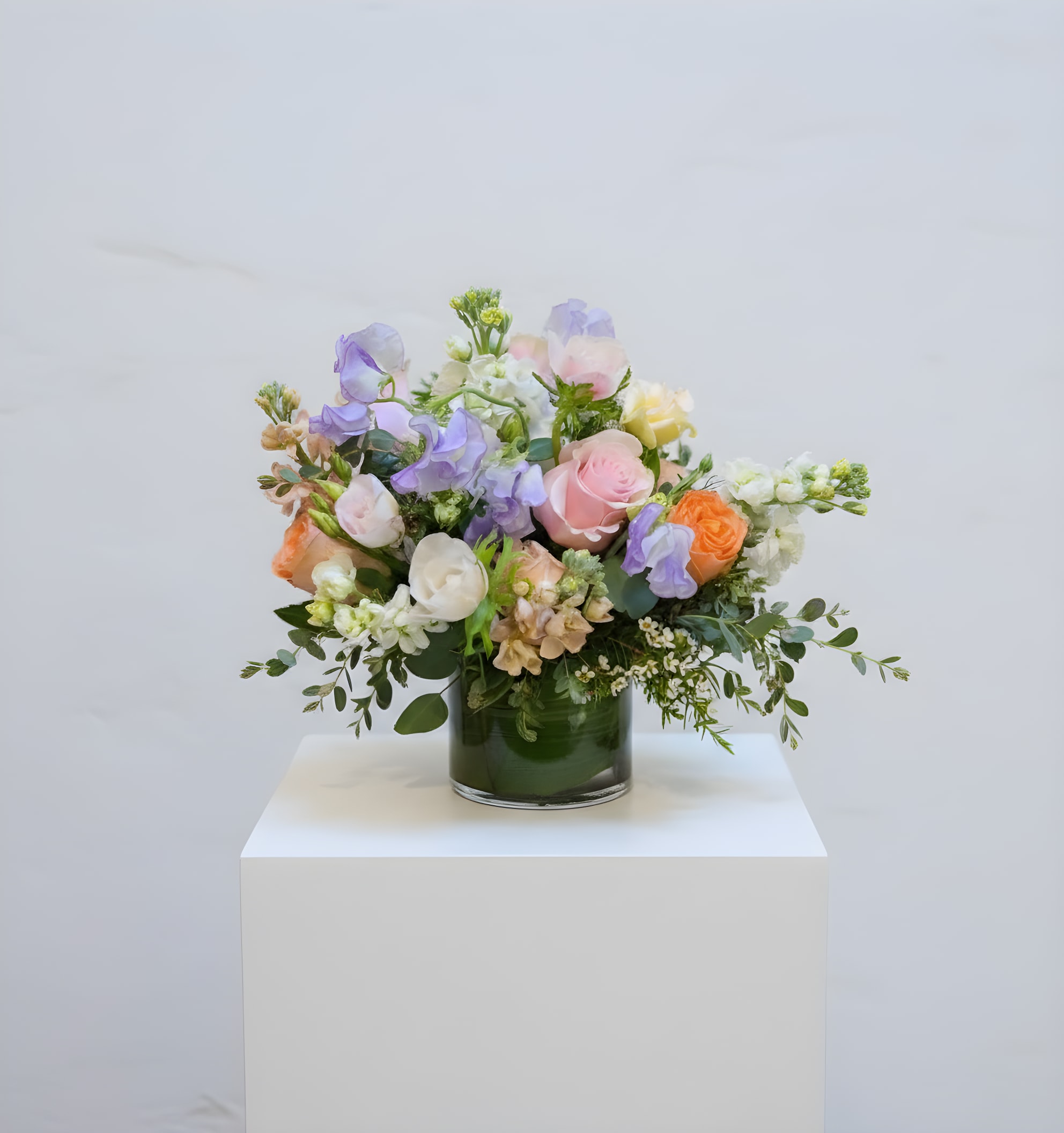 Spring Meadow - An elegant mix of muted tones. This arrangement is a wonderful gift to brighten anyone's day.