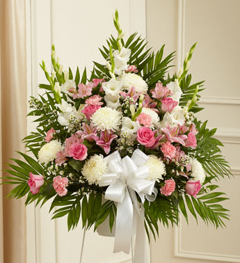 Heartfelt Sympathies Pink &amp; White Standing Basket - Product ID: 91265   It can be difficult to find the perfect way to express all the sympathy, care and concern you feel during times of sorrow. Artistically crafted by our expert florists using fresh, beautiful pink and white flowers, this standing basket arrangement is a heartfelt way to convey all the love and support you have in your heart. Standing basket arrangement of fresh pink and white flowers such as roses, lilies, mums, snapdragons, carnations and more Appropriate for family, friends or business associates to send directly to the funeral home Our florists use only the freshest flowers available, so colors and varieties may vary Large measures approximately 38"H x 38"L without stand Medium measures approximately 32"H x 36"L without stand Small measures approximately 30"H x 34"L without stand Stand may not be available in all areas
