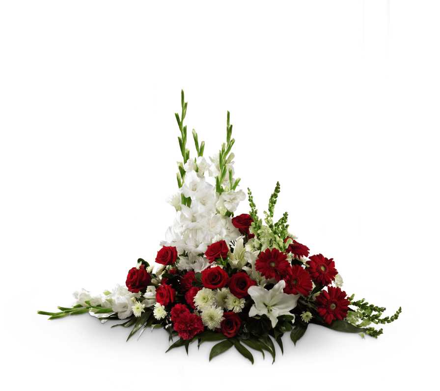 The Crimson &amp; White Arrangement - The Crimson &amp; White Arrangement is a lovely symbol of peace and love. Red roses, carnations and gerbera daisies pop against the white blooms of gladiolus, snapdragons, Oriental lilies, and chrysanthemums. Accented with a variety of lush, vibrant greens, this exquisite arrangement is a beautiful tribute to the deceased.