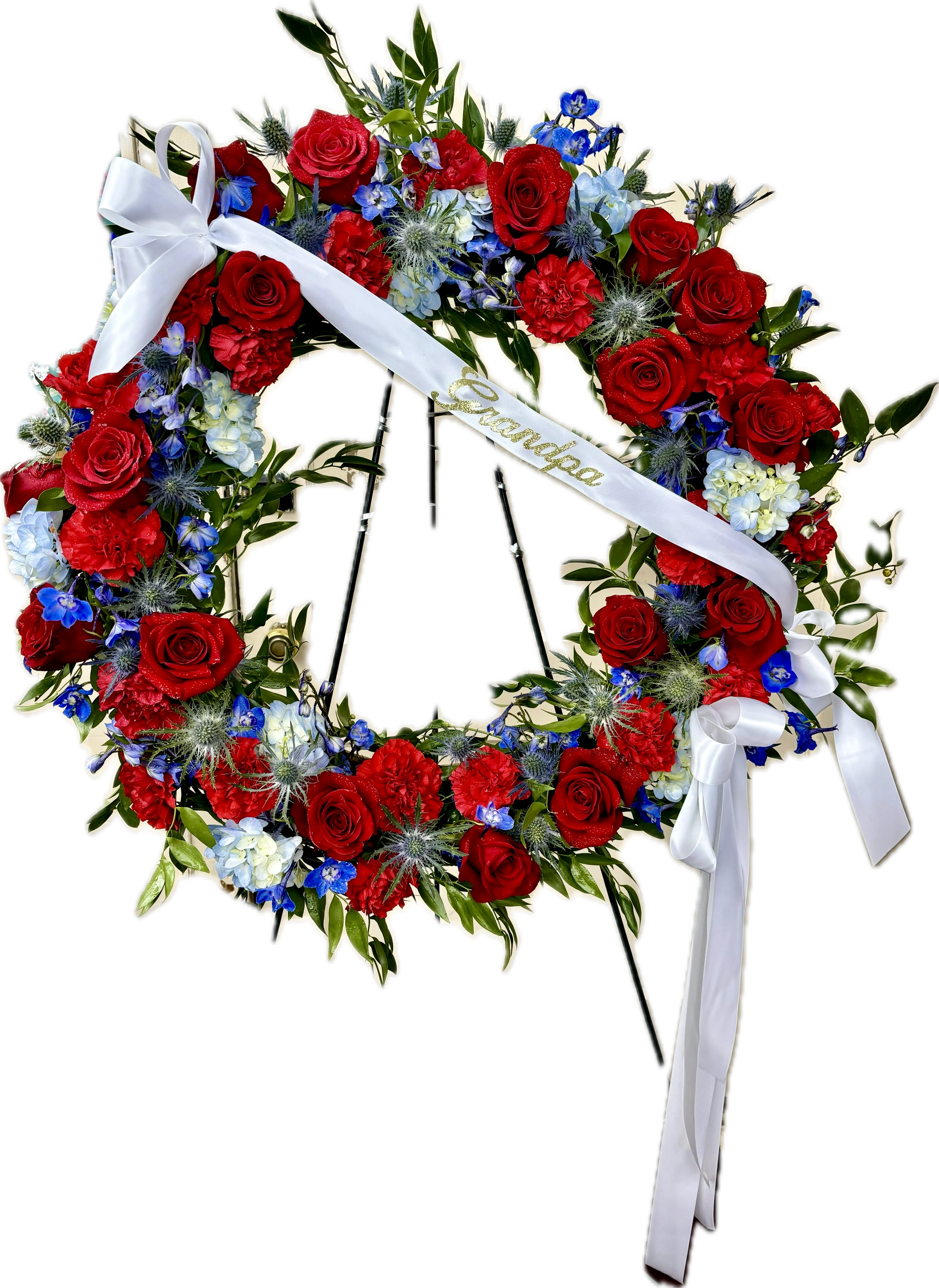 Ringed by Love - The memory of brighter days is always a comfort to those in mourning. This lovely wreath will display your compassion beautifully. 