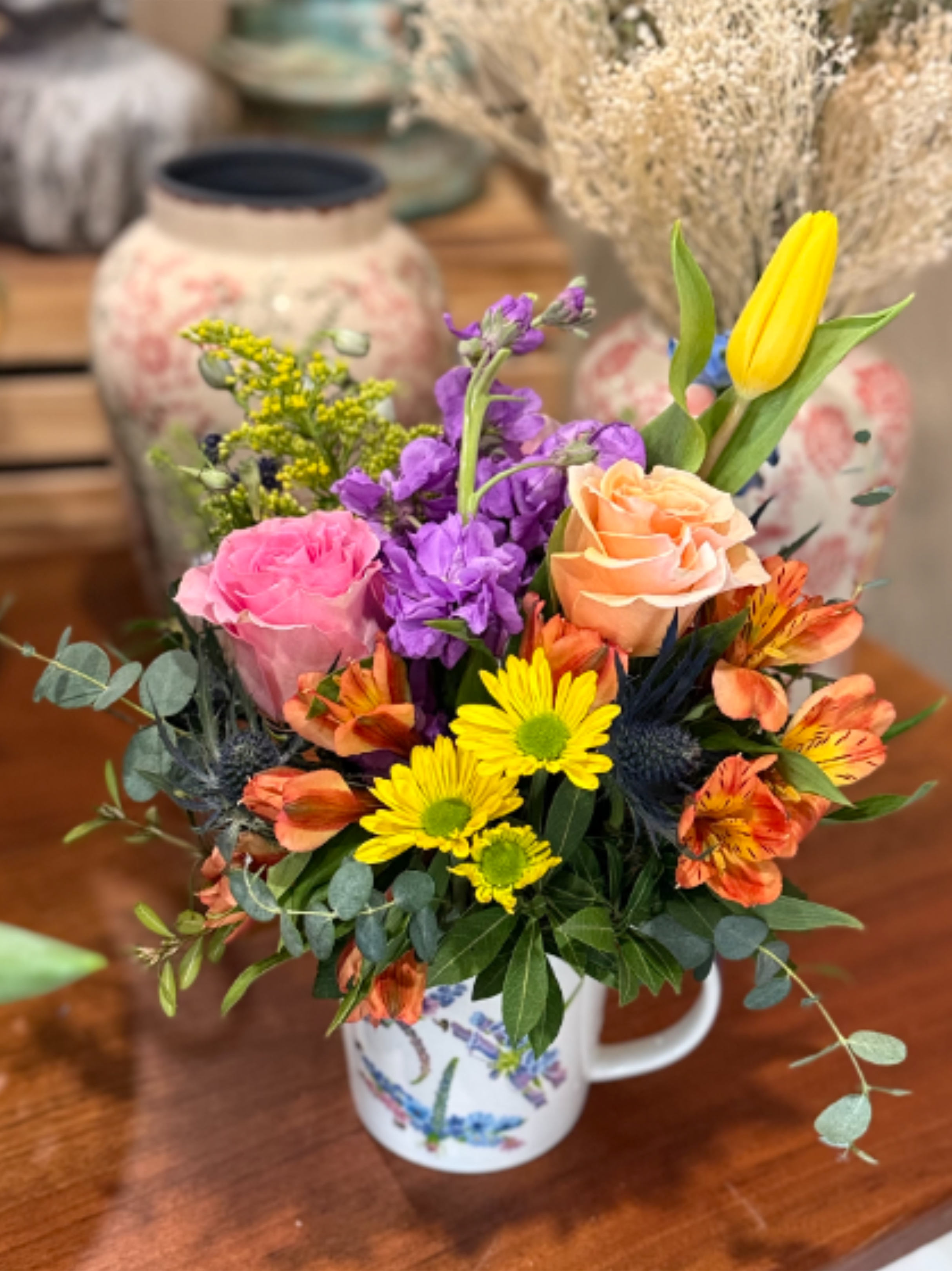 Large Tea Cup of Flowers  - Bright and cheery arrangement in a deacorative tea cup. 