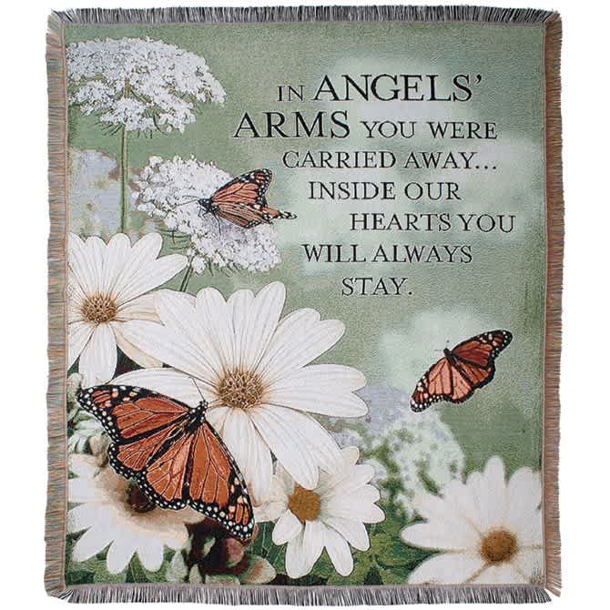 Memorial blanket with white daisies, butterflies, and a sympathy message