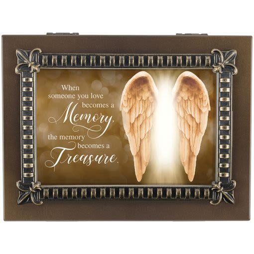 Framed memorial plaque with angel wings and a sympathy quote