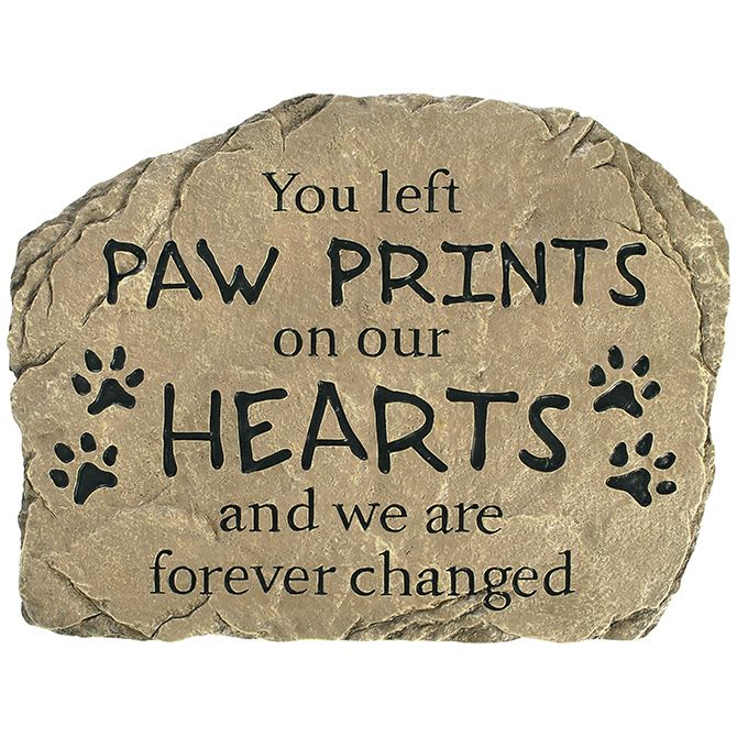 Memorial stone with paw prints and a sympathy message
