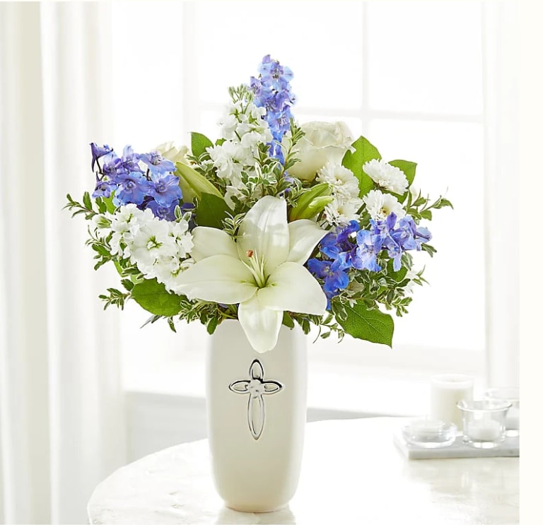 Heavenly Blossoms Bouquet - Heavenly blossoms indeed, this bouquet makes a beautiful gift to offer condolences or to honor a religious holiday.(FTD design)