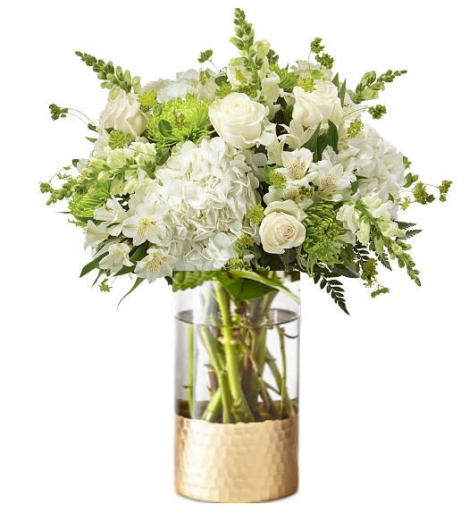 Natural beauty  floral arrangement - Elevate any occasion with our lush floral arrangement featuring   green colour palette and an elegant array of roses, snapdragons, hydrangea and alstroemeria.  complemented by lush green fillers   this arrangement exudes elegance and sophistication. Order now to add a touch of natural beauty to your space or to delight someone special with this stunning display!