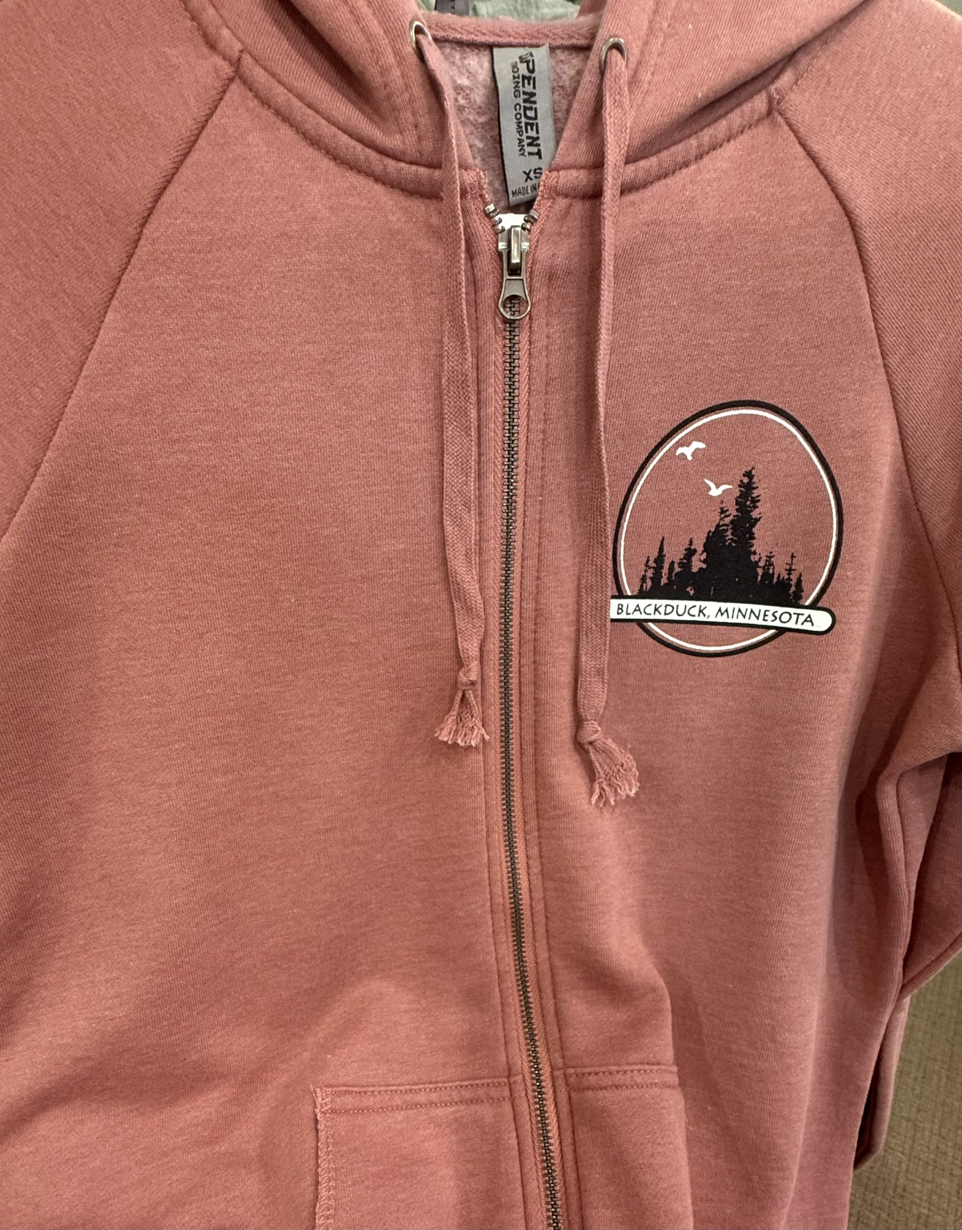 Pink zip-up hoodie with a Blackduck, Minnesota patch