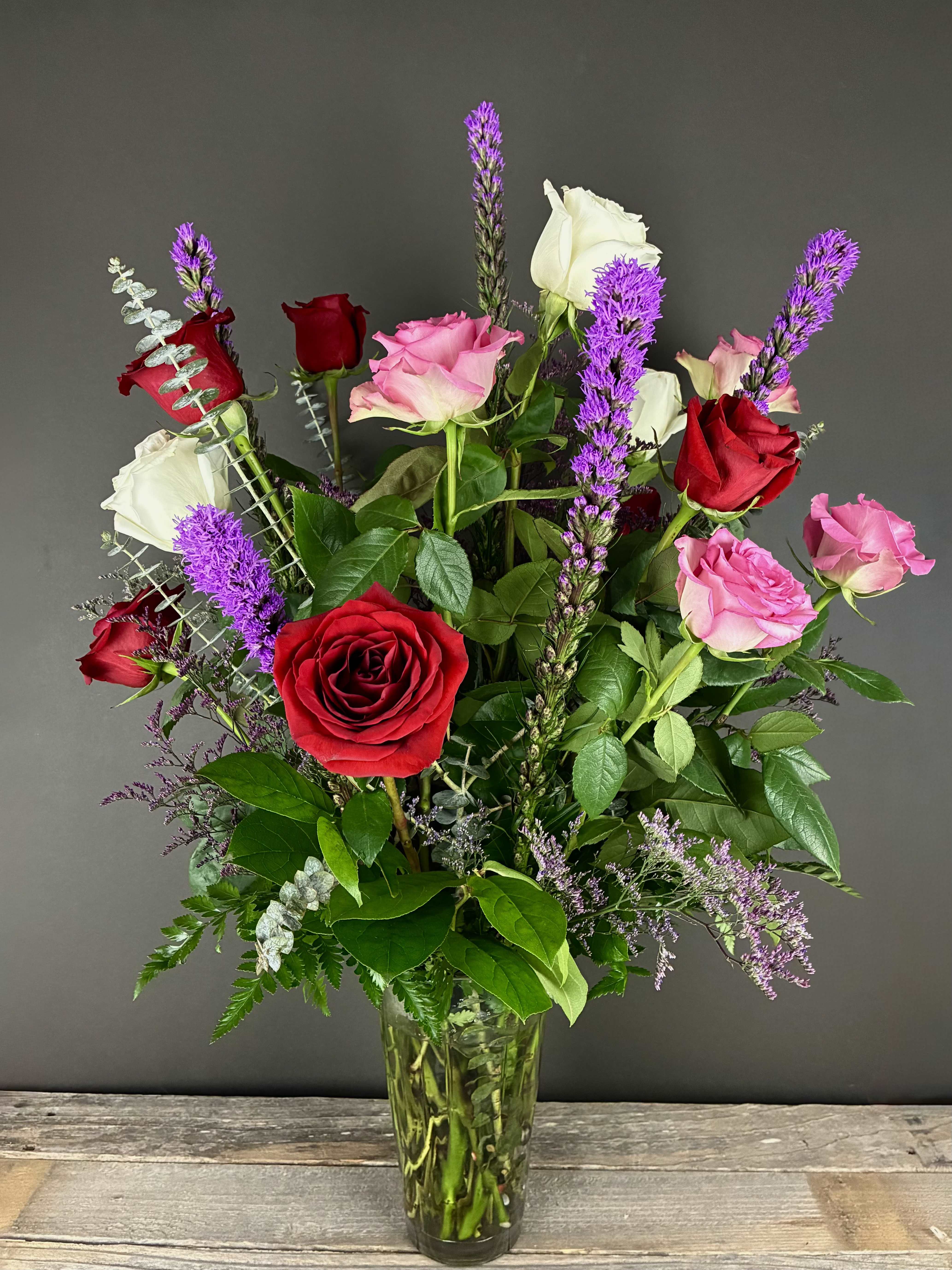Sweetheart- Dozen Rose Arrangment - This stunning dozen rose arrangement is the perfect gift for your sweetheart! To ensure we have the correct color of roses on hand, please order no sooner than 48 hours before your desired delivery date.