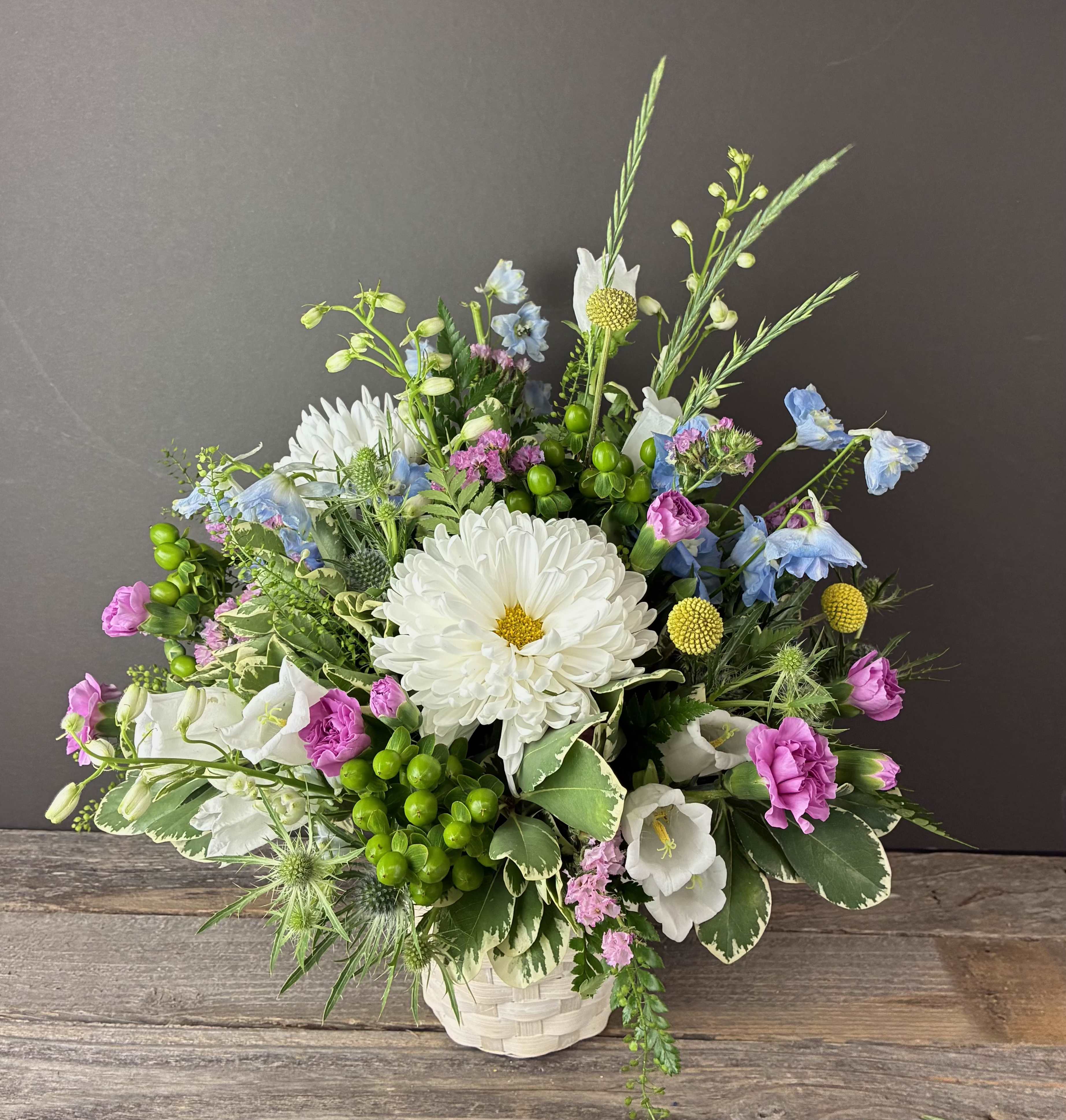 In The Meadow - Wild and whimsical, like a stroll through the meadow! This arrangement brings feelings of bright days and good memories!