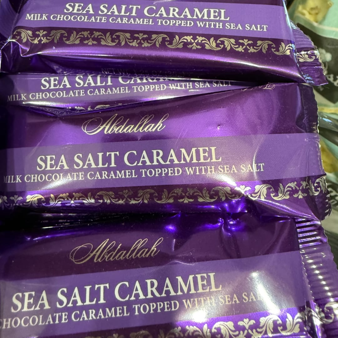 Stack of purple sea salt caramel chocolate candy bars