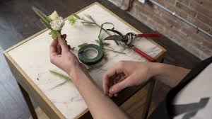 Boutonnière Designer's Choice  - Custom floral boutonniere designed with florals, and greenery. Includes two pins
