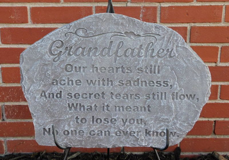 Engraved memorial stone with the word Grandfather and a poem