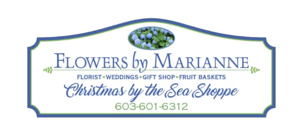 Floral shop sign reading Flowers by Marianne and Christmas by the Sea Shoppe