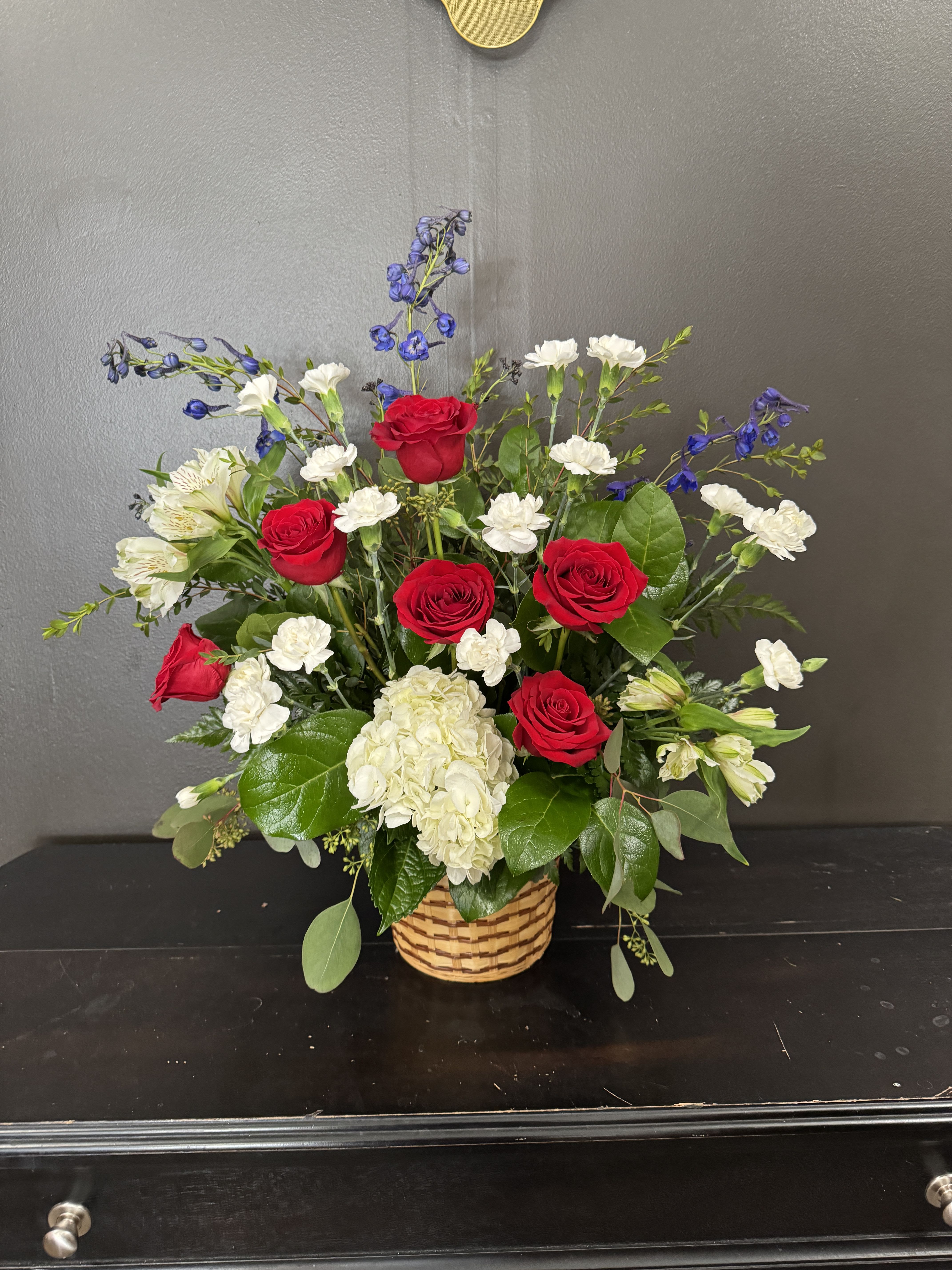 Forever Remembered - A red white and blue assortment in a basket