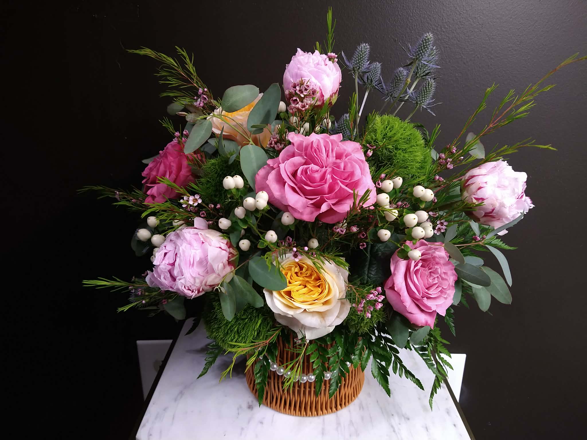 Mother's Of Pearls Basket - Beautifully arranged garden style flowers in a keepsake basket with a pearl handle.